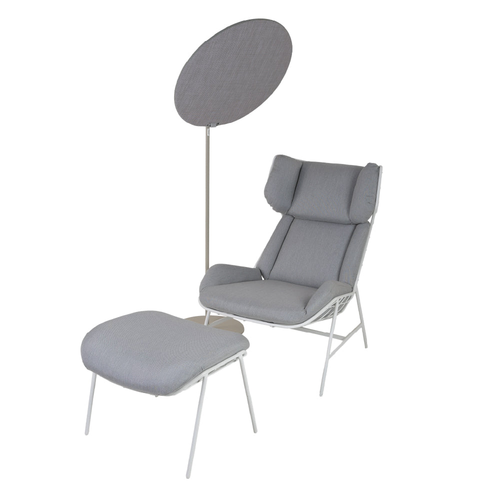 Grey sun lounger with umbrella and table