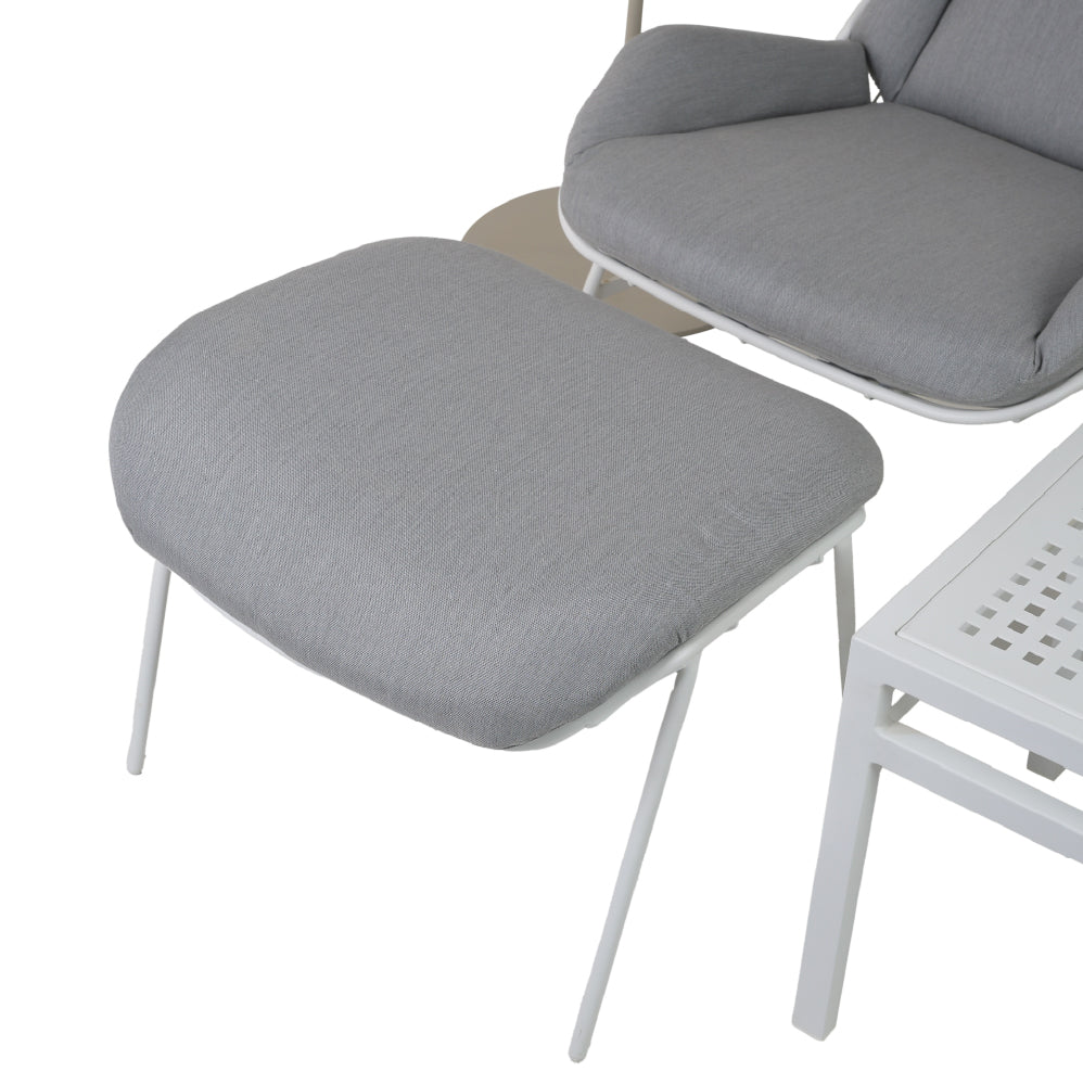Grey sun lounger with umbrella and table