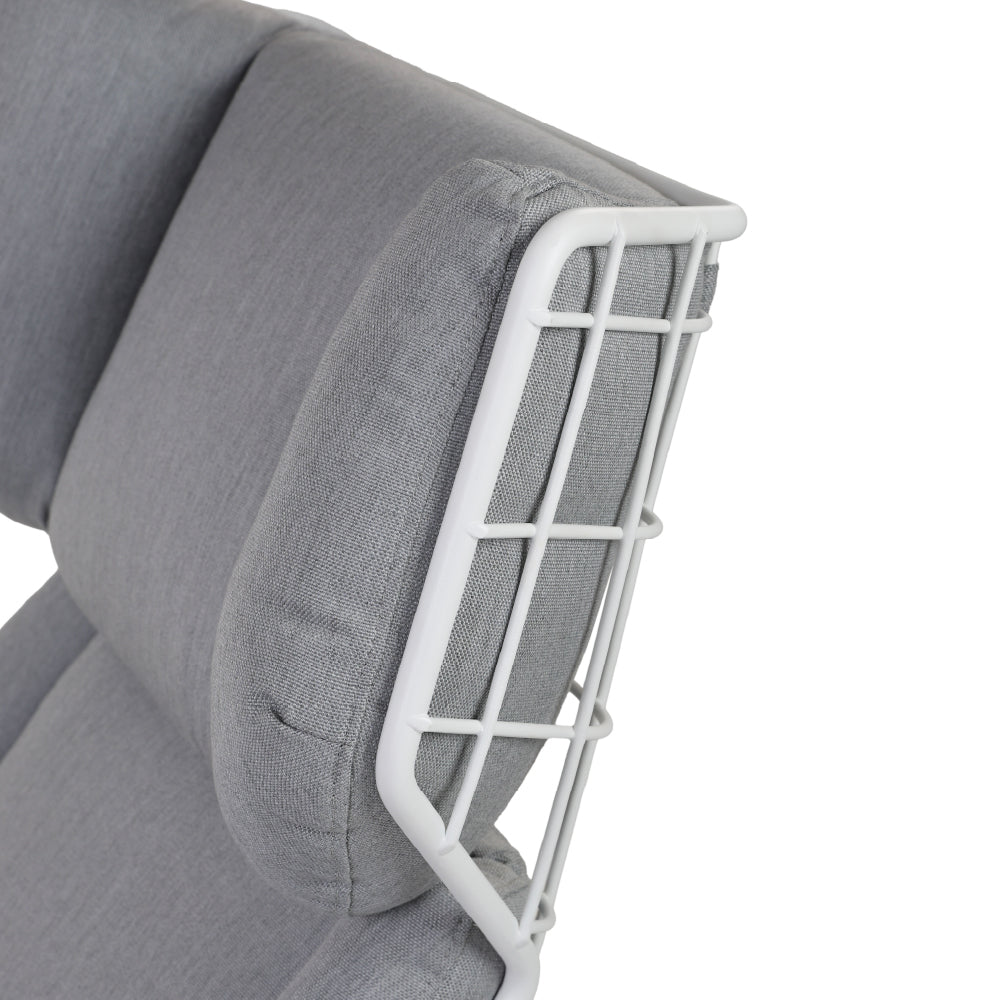 Grey sun lounger with umbrella and table