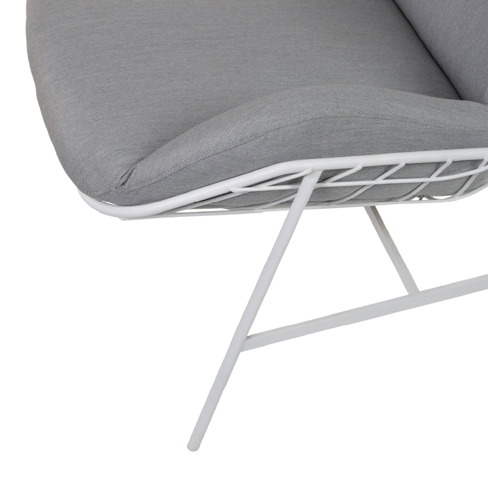 Grey sun lounger with umbrella and table